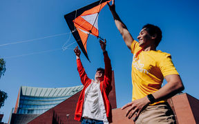 Students flying kite