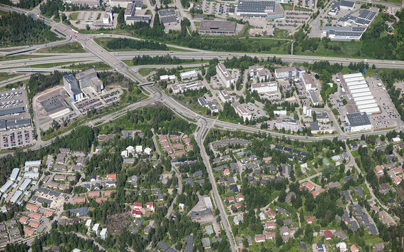 A bird perspective picture of Sinimäki area in Espoo, with housing stock and roads.