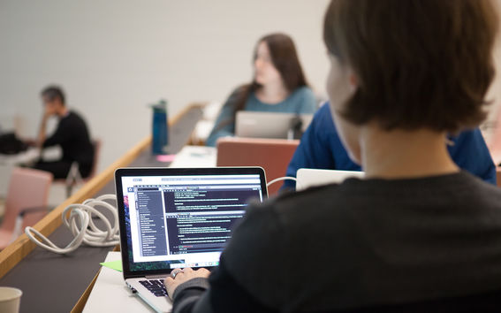 Person using laptop at Coderefinery workshop, photo: Matti Ahlgren / Aalto University