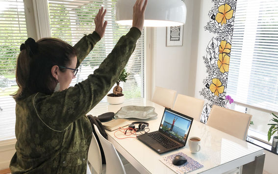 Anitta doing home exercise as a part of Wellbeing week's remote work event.  Photo: Anitta Pirnes