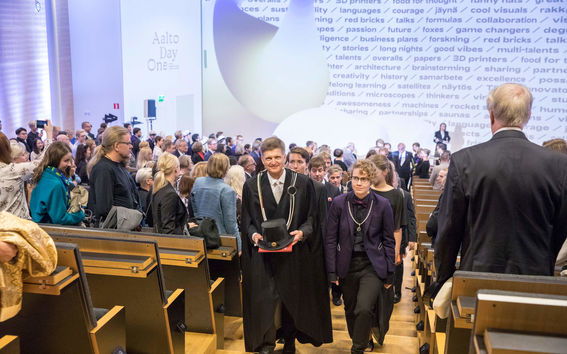 President Ilkka Niemelä and AYY Chair Noora Jaakkola in the middle, leaving the auditorium in Aalto Day One 2018 ceremony.