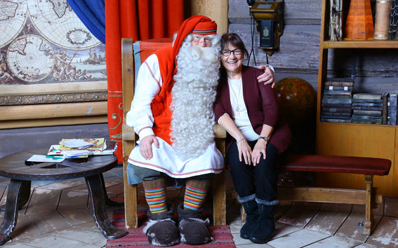 Visiting professor Beryl Pittman visiting Santa Claus in Finland.