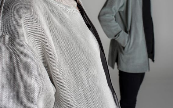 Two jackets made of optimized textiles for covering solar cells