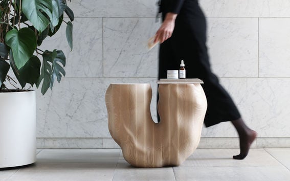 a organic shaped wooden side table 