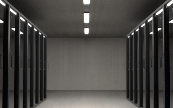 view of gray room with floor to ceiling dark windowed servers racks on both sides
