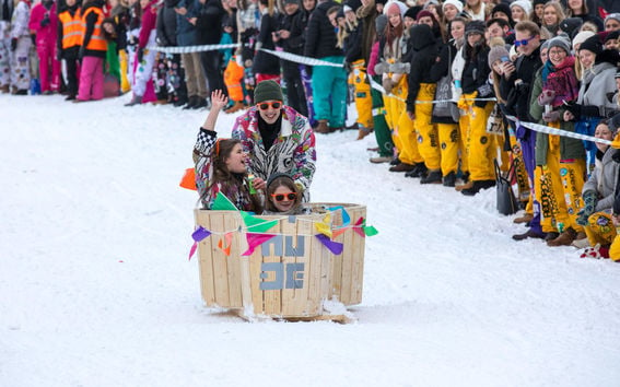 The picture shows students in a funny sledge during Laskiainen, a pre-Easter celebration 