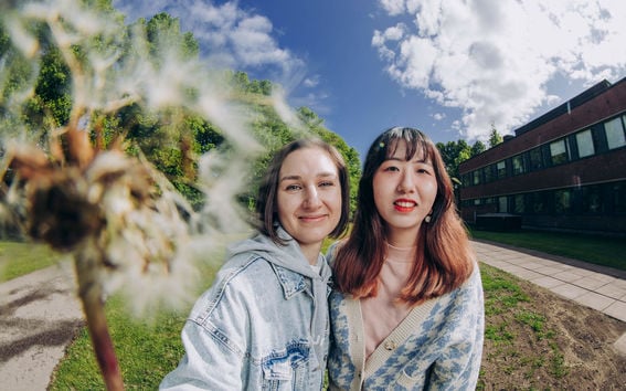 Two students on Aalto University campus