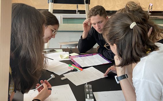 Students working in a group at the Unite! Summer School on Design Thinking and Product Development at Aalto University in August 2023