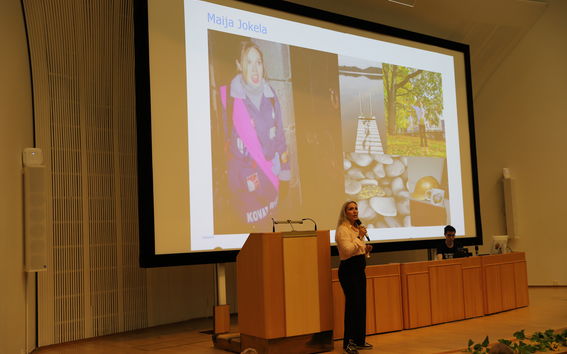 Maija Jokela giving a speech in Aalto lecture hall