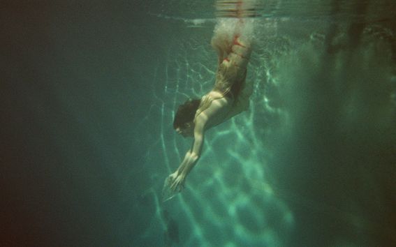 A human diving under water. Photo: Hayley Le