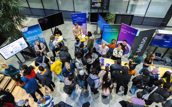 Students meeting companies in a networking event.