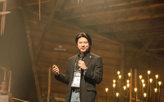 Vincent Kuo speaking at an event.