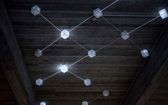 Artwork with black and white light cubes