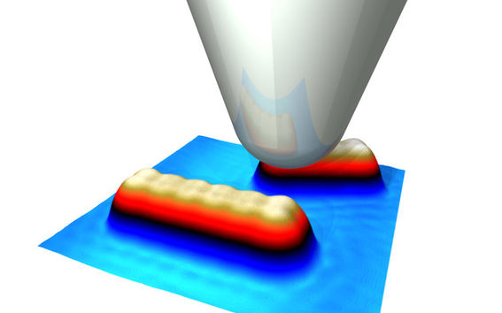 Schematic of the tip of a scanning tunneling microscope on a graphene nanoribbon. Picture: Peter Liljeroth's team.