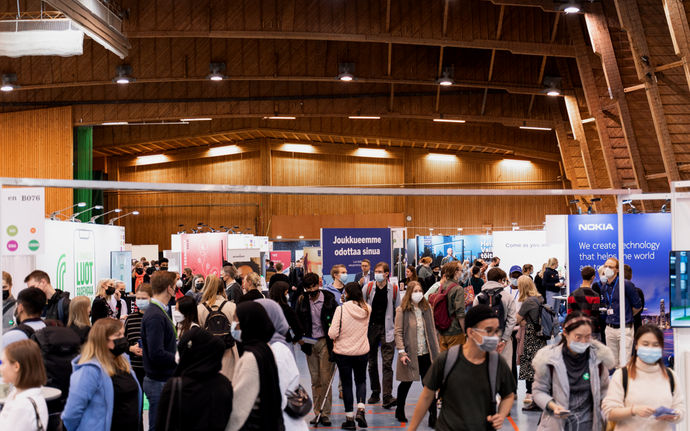 Many people excitedly participating in Aalto Talent Expo fair