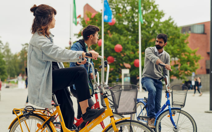 Students biking at the campus.