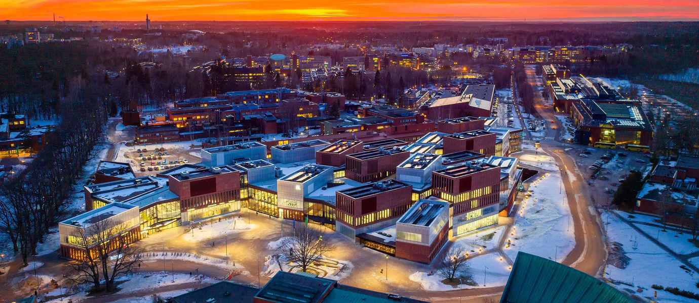 An aerial view of the Aalto University campus at sunset/ Photo by Mika Huisman