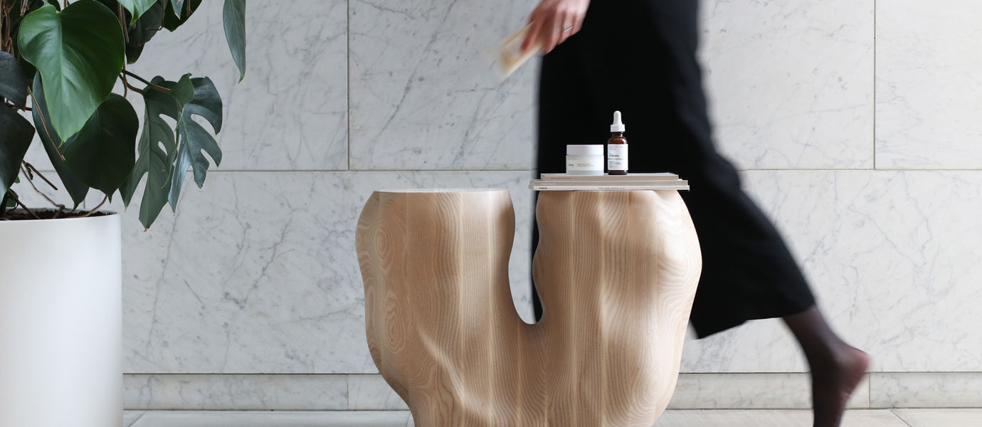 a organic shaped wooden side table 