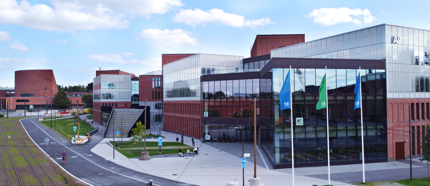 Picture of Aalto University School of Business building captured from outside in the spring.