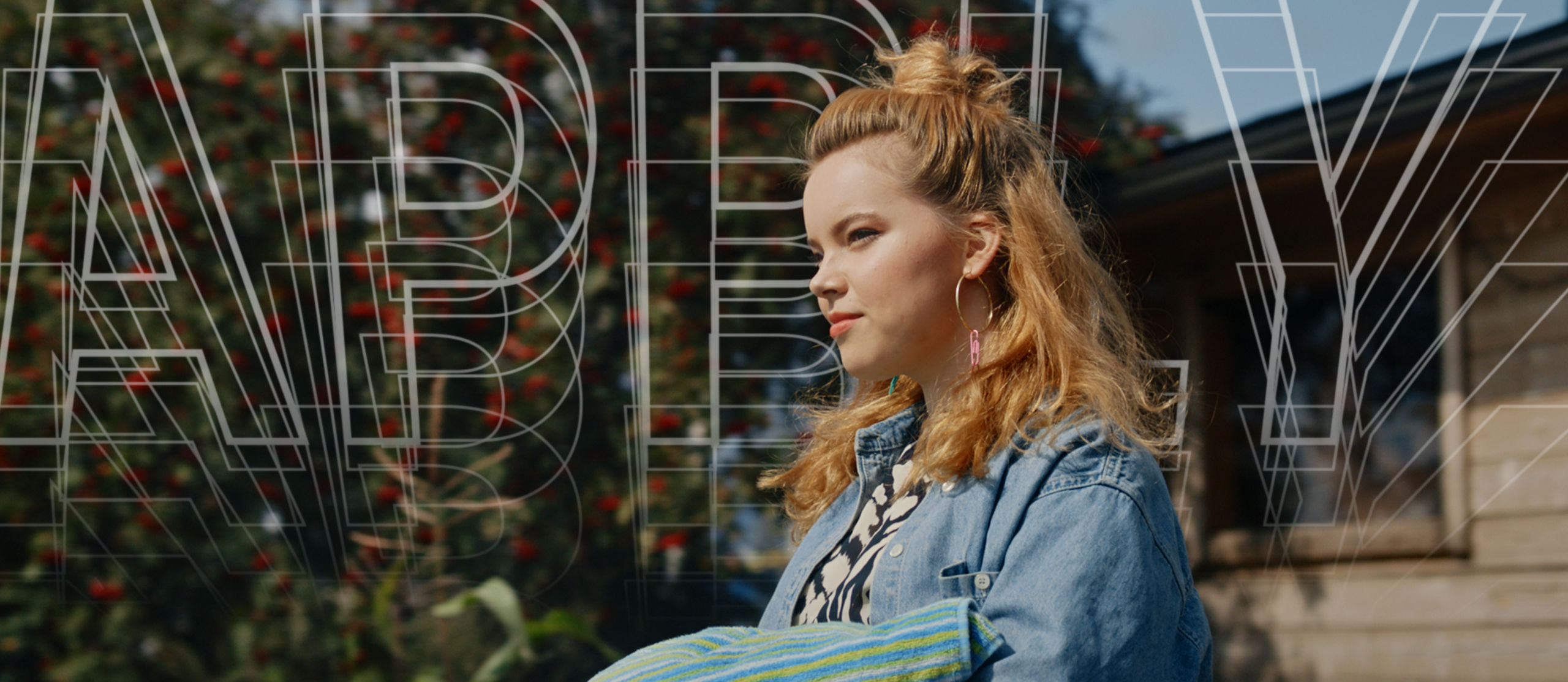 Woman in foreground with the text Apply in background