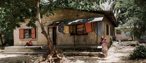 Woman, child and house in Zanzibar