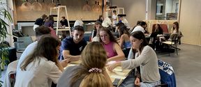 Students working in groups at the Unite! Summer School on Design Thinking and Product Development in August  2023