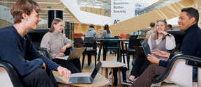 Students sitting at Aalto University School of Business
