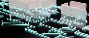 close up image of an illuminated mint coloured 3D printed floor plan on black glass