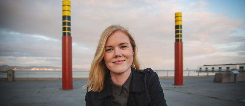 Close-up photo of Katja Toropainen standing at a bay.