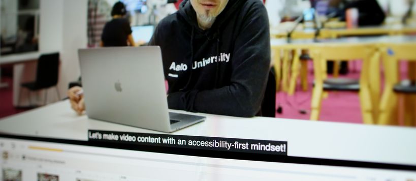 A screen capture of video with captions