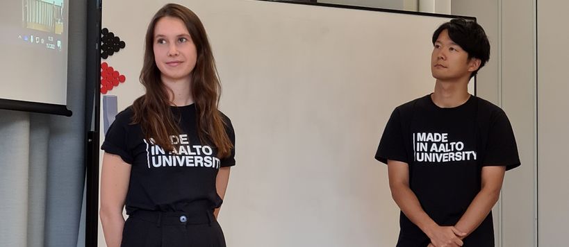 Liva Gramlow and another student standing in front of the classroom giving their final presentations at Digital Business Master Class by Aalto University Summer School.