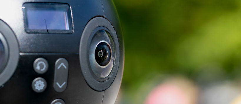 360 camera closeup with a blurred background, photo taken by Valeria Azovskaya outdoor at Aalto campus, August 2022