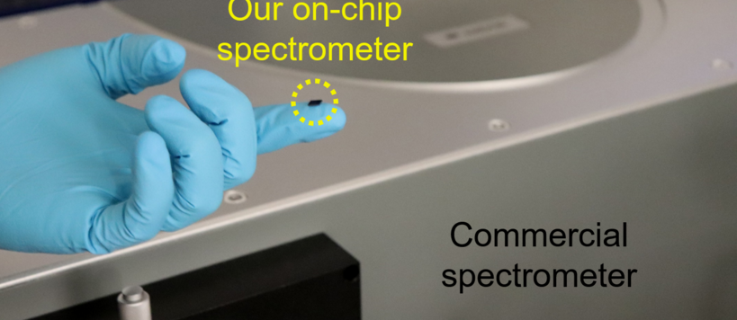 A fingertip-sized on-chip spectrometer in the foreground compared to a commercial benchtop-size spectrometer in the background. Photo: Aalto University