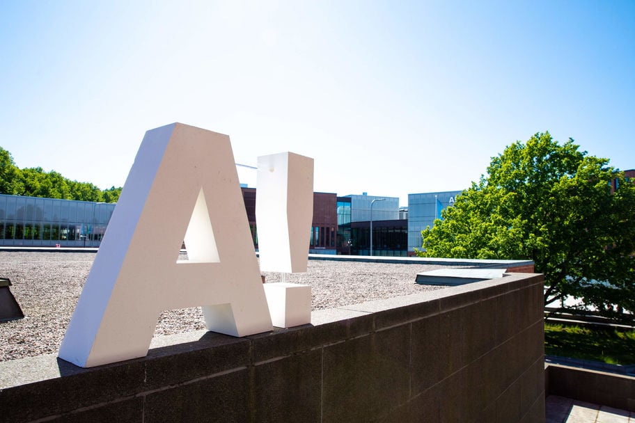 Aalto university logo outside in the campus area. 