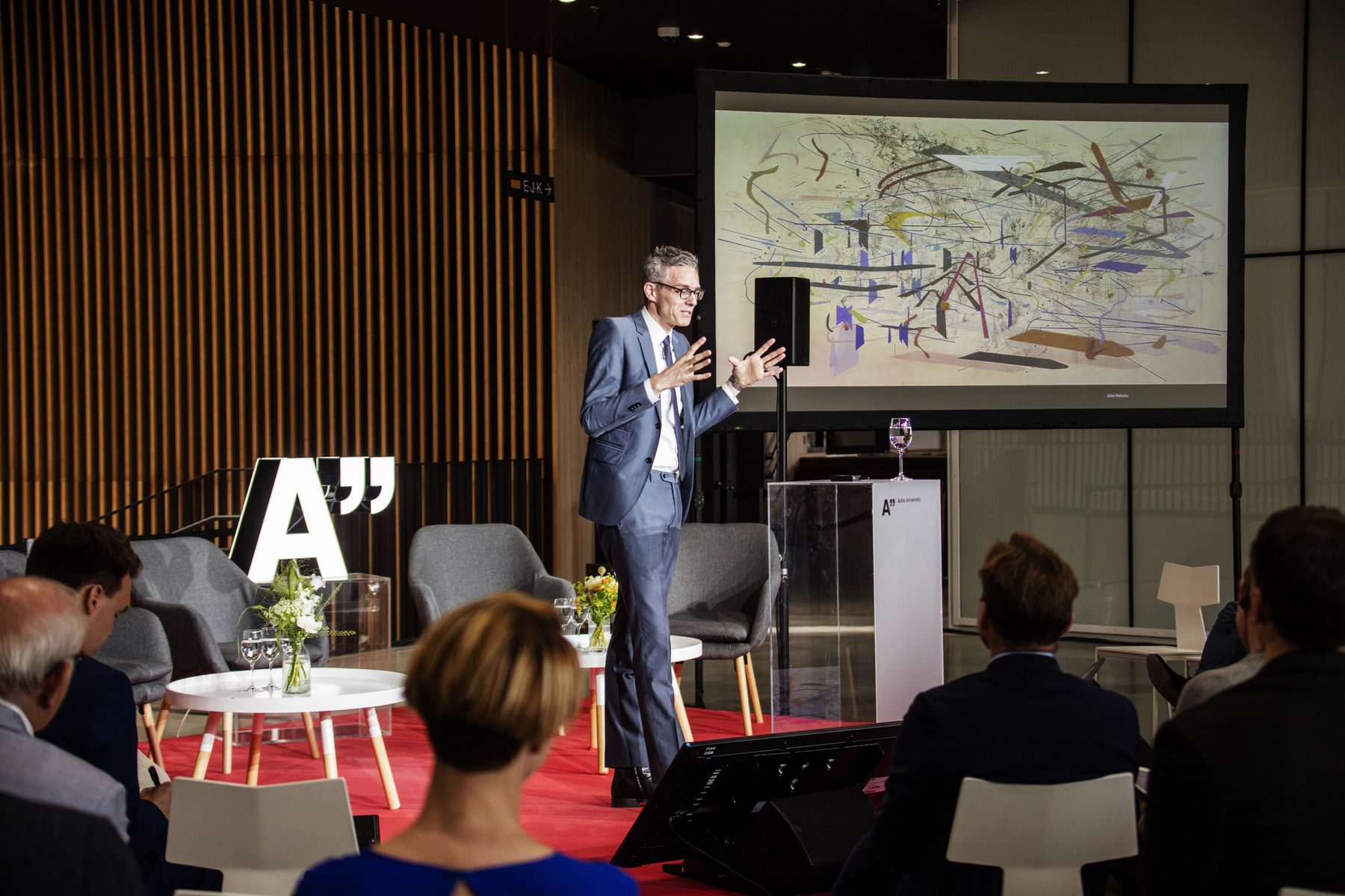 Aalto Vision Forum keynote speaker giving inspiring talk