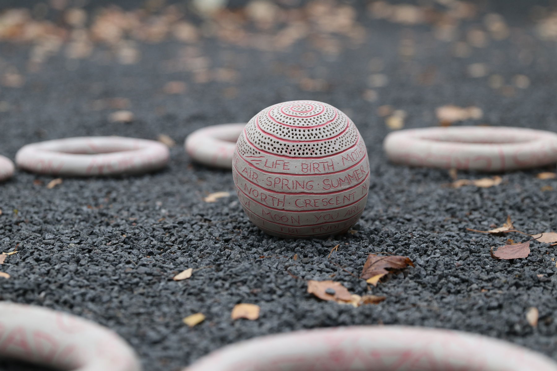 a close-up of a ceramic ball on ground