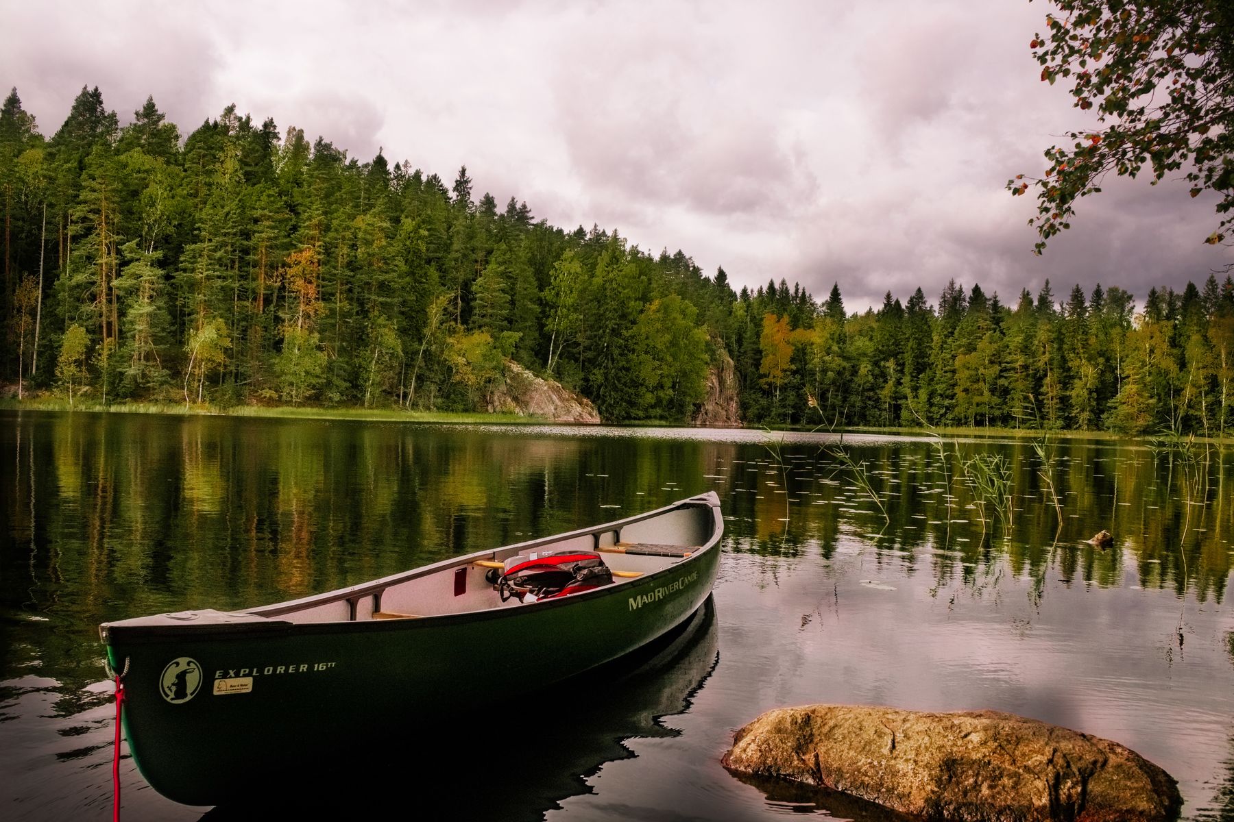 Canoe in Nuuksio National Park lake in the autumn