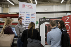 Visitors getting to know Remion's digital twin of a Smart Booth