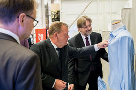 Prime Minister of Denmark Lars Lokke Rasmussen investigated a shirt made of recycled jeans by Ioncell-F technology. Professor Herbert Sixta introduced the innovation.