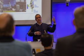Event photo: Jose Costa-Requena presenting the 5G Force program. 