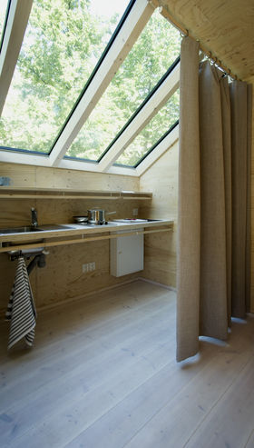The kitchen of the Kokoon living unit, Wood Program, Photo by Anne Kinnunen