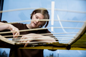 Julia Lohmann working on her installation called Hidaka Ohmu. Photo: Mikko Raskinen