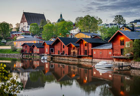 Red wooden houses riverside