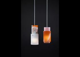 two coloured glass lamps hanging