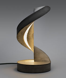 spiral shaped lamp made of concrete