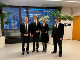 Professor Dr. Ralph Krupke, Dr. Eldar Khabushev, Professor Tanja Kallio, Dr. Alber Nasibulin pose for a photo
