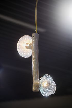 Hanging light with two organically textured lamp shades made of glass