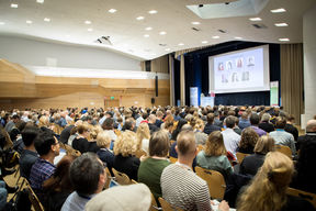Full lecture hall at Dipoli