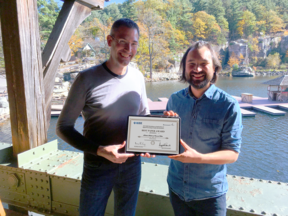 professor Habets and professor  Schlecht holding the best paper award certificate