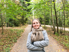 Salli in the forest smiling